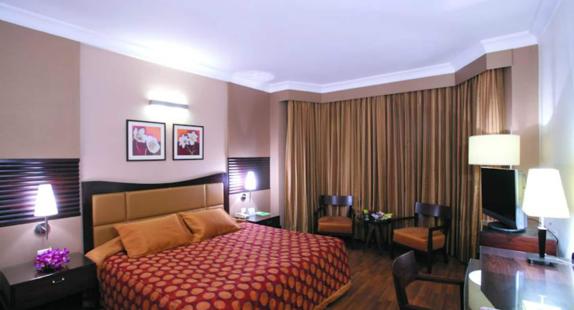 The Retreat Hotel & Convention Centre Мумбаи Номер фото
